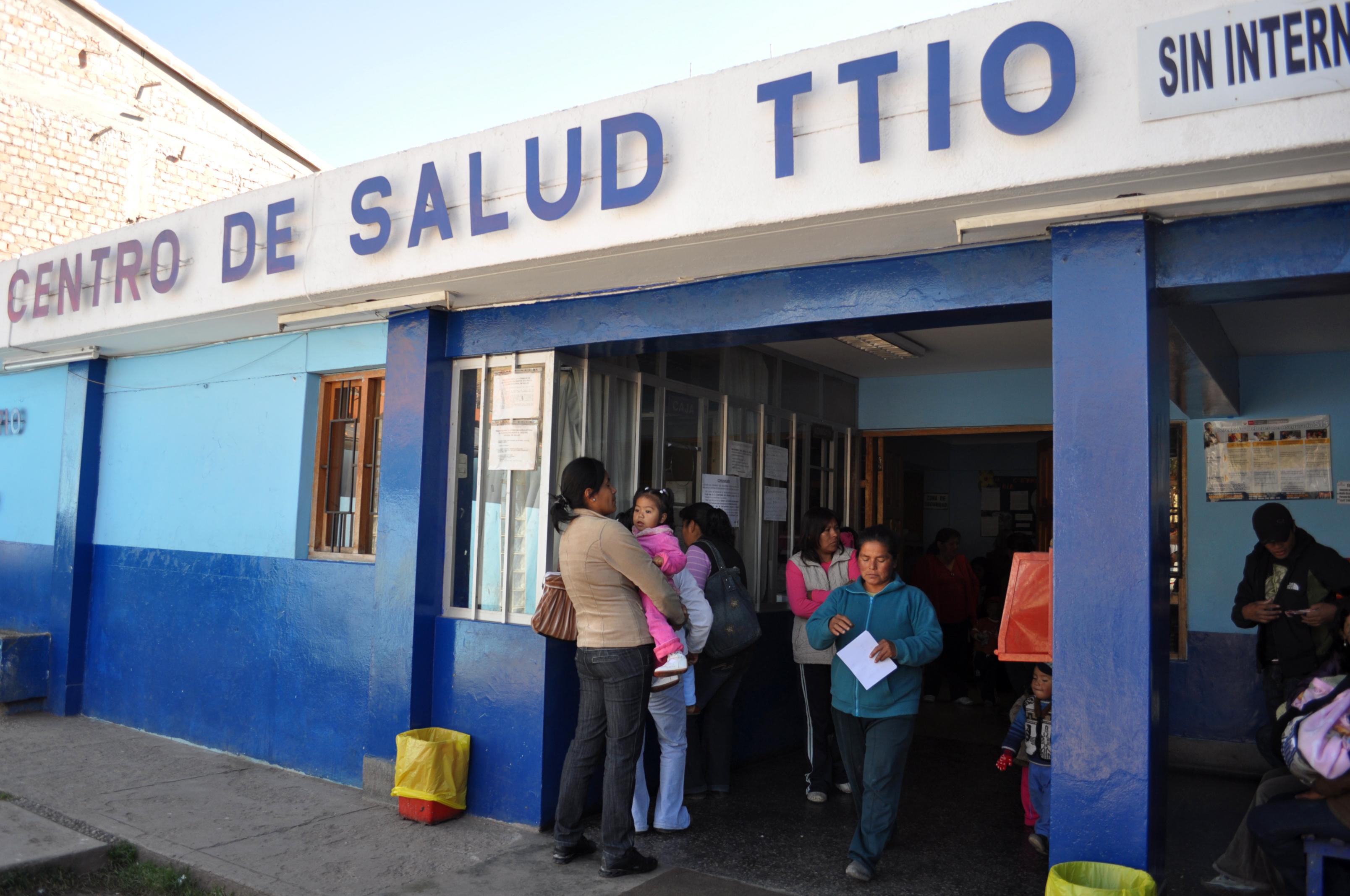 People queue outside local surgery whilst waiting to be seen by Projects Abroad interns on their medical internship in Peru. Locals are seen queueing outside a local surgery waiting to see Projects abroad interns on theri medical internship in Peru.